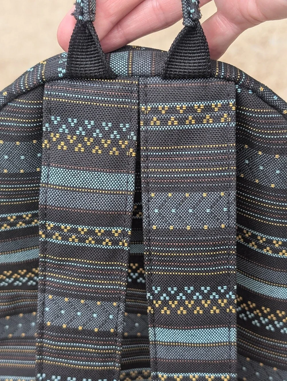 Dakine Cosmo 6.5L Mini Backpack.